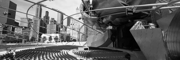 Black & White Cityscapes: Low Angle View Of Buildings In A City, Pritzker Pavilion, Millennium Park, Chicago, Illinois, USA by Panoramic Images