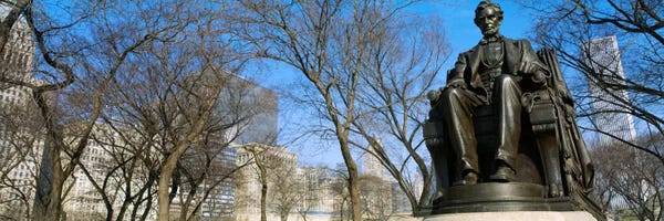 Abraham Lincoln: Low angle view of a statue of Abraham Lincoln in a park, Grant Park, Chicago, Illinois, USA by Panoramic Images
