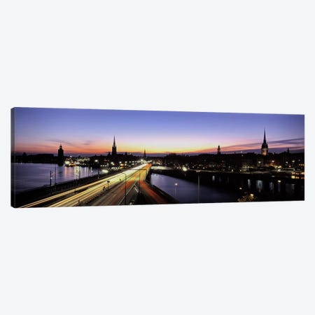 Blurred Motion View Of Nighttime Traffic On Centralbron, Stockholm, Sweden Canvas Print #PIM5031} by Panoramic Images Canvas Print