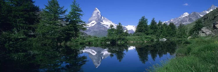 A Snow-Covered Matterhorn And Its Reflection In Grindjisee, Pennine Alps, Switzerland