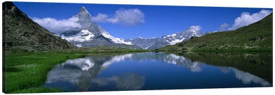 A Snow-Covered Matterhorn And Its Reflection In Riffelsee, Pennine Alps, Switzerland Canvas Art Print