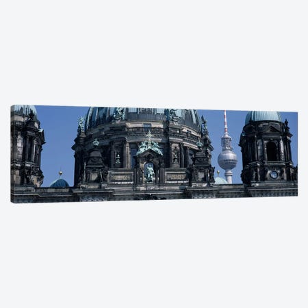 Low angle view of a church, Berliner Dom, with Television Tower (Fernsehturm) in distance, Berlin, Germany Canvas Print #PIM5068} by Panoramic Images Canvas Artwork