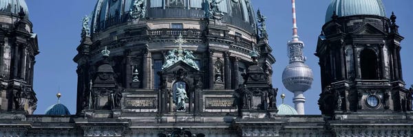 Berlin: Low angle view of a church, Berliner Dom, with Television Tower (Fernsehturm) in distance, Berlin, Germany by Panoramic Images