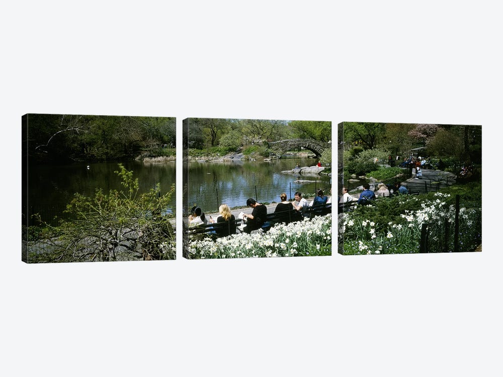 Group of people sitting on benches near a pond, Central Park, Manhattan, New York City, New York State, USA by Panoramic Images 3-piece Art Print