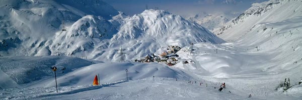 Snowy Mountains: Rear view of a person skiing in snow, St. Christoph, Austria by Panoramic Images