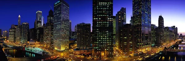 Buildings lit up at duskChicago, Illinois, USA
