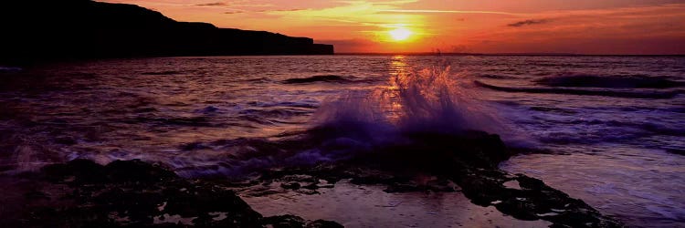 Wave Breaking on RocksBempton, Yorkshire, England, United Kingdom