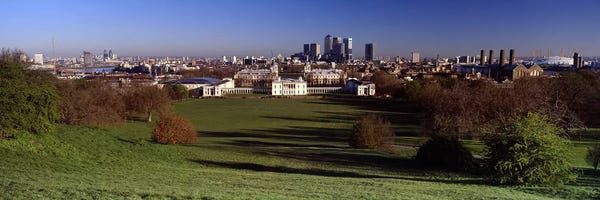 Distant View Of Canary Wharf On The Isle Of Dogs From Greenwich Park, London, England
