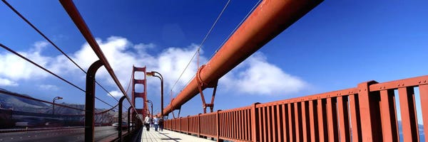 Golden Gate Bridge: Tourist Walking on A BridgeGolden Gate Bridge, San Francisco, California, USA by Panoramic Images