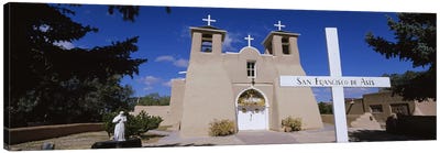 Cross in front of a church, San Francisco de Asis Church, Ranchos De Taos, New Mexico, USA Canvas Art Print