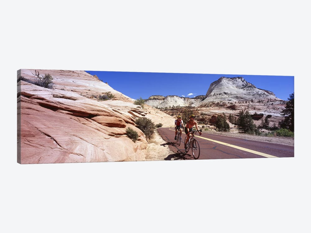 Two people cycling on the road, Zion National Park, Utah, USA by Panoramic Images 1-piece Canvas Print