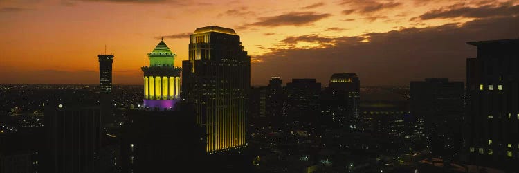 High angle view of buildings lit up at dusk, New Orleans, Louisiana, USA