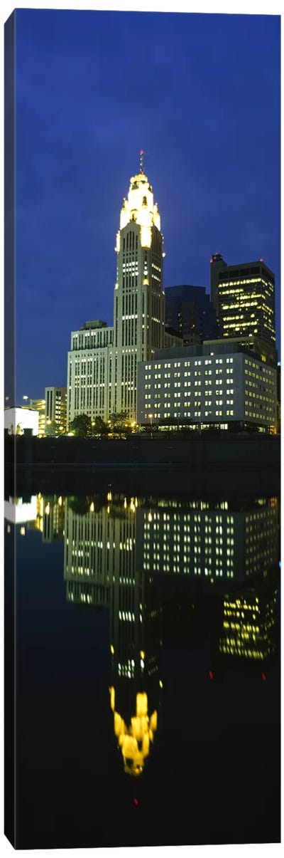 Buildings in a city lit up at night, Scioto River, Columbus, Ohio, USA Canvas Art Print - Columbus Art