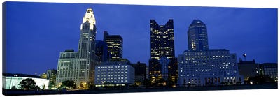 Low angle view of buildings lit up at night, Columbus, Ohio, USA Canvas Art Print