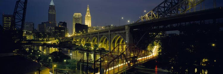 Arch bridge & buildings lit up at nightCleveland, Ohio, USA