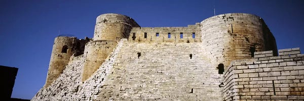 Syria: Low angle view of a castle, Crac Des Chevaliers Fortress, Crac Des Chevaliers, Syria by Panoramic Images