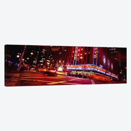 Bluirred Motion View Of Traffic Around Radio City Music Hall, Rockefeller Center, Manhattan, New York City, New York, USA Canvas Print #PIM5456} by Panoramic Images Canvas Artwork