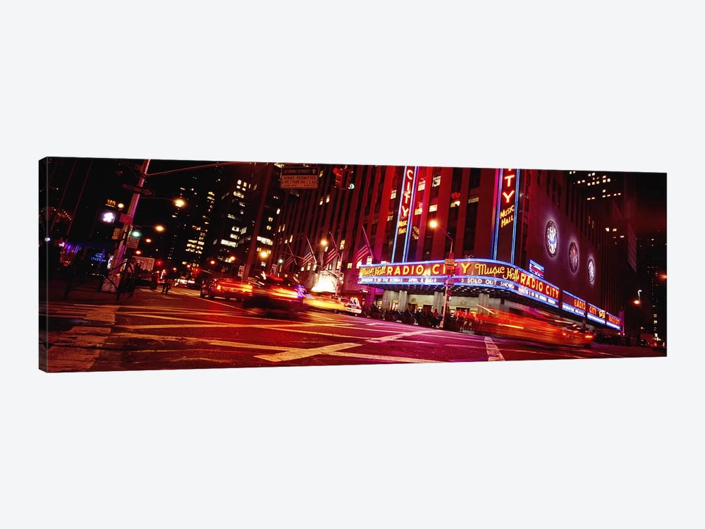 Bluirred Motion View Of Traffic Around Radio City Music Hall, Rockefeller Center, Manhattan, New York City, New York, USA by Panoramic Images 1-piece Canvas Art