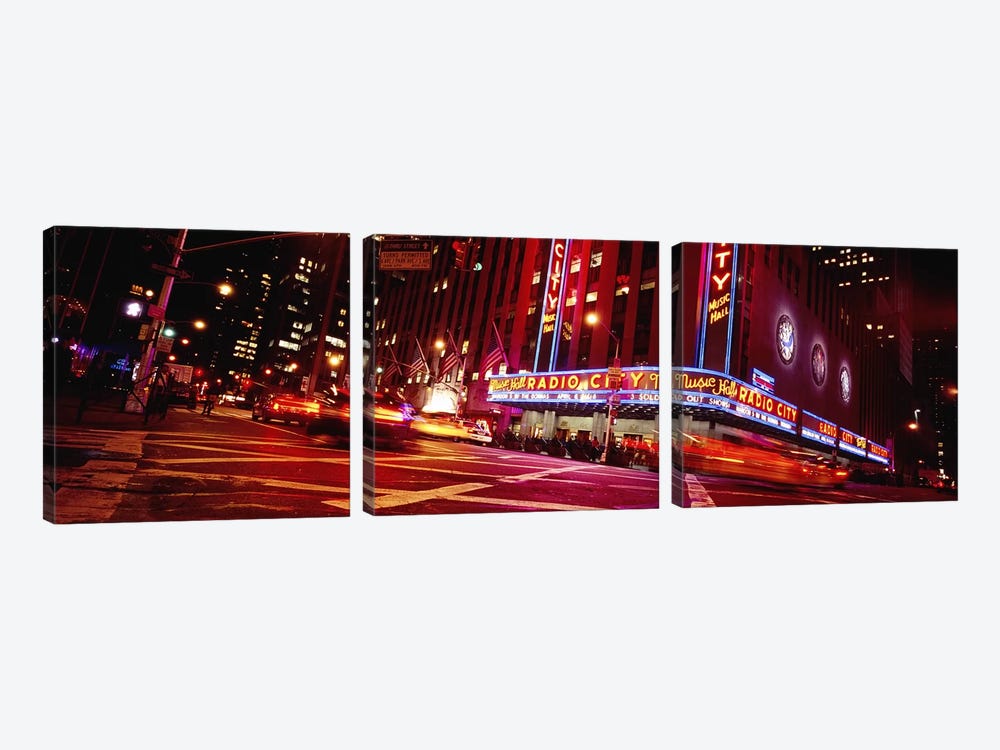 Bluirred Motion View Of Traffic Around Radio City Music Hall, Rockefeller Center, Manhattan, New York City, New York, USA by Panoramic Images 3-piece Canvas Artwork