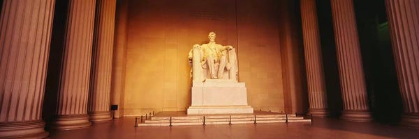 Low angle view of a statue of Abraham Lincoln, Lincoln Memorial, Washington DC, USA