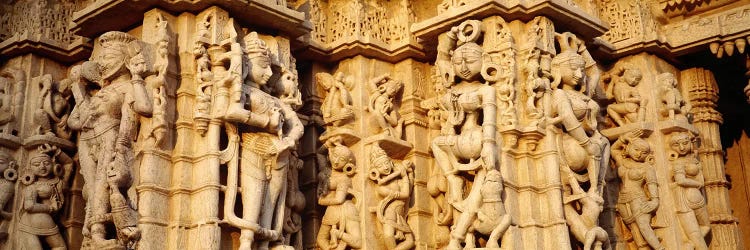 Sculptures carved on a wall of a temple, Jain Temple, Ranakpur, Rajasthan, India