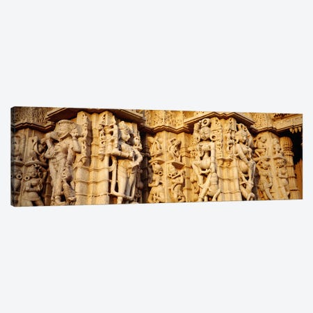 Sculptures carved on a wall of a temple, Jain Temple, Ranakpur, Rajasthan, India Canvas Print #PIM5468} by Panoramic Images Canvas Art