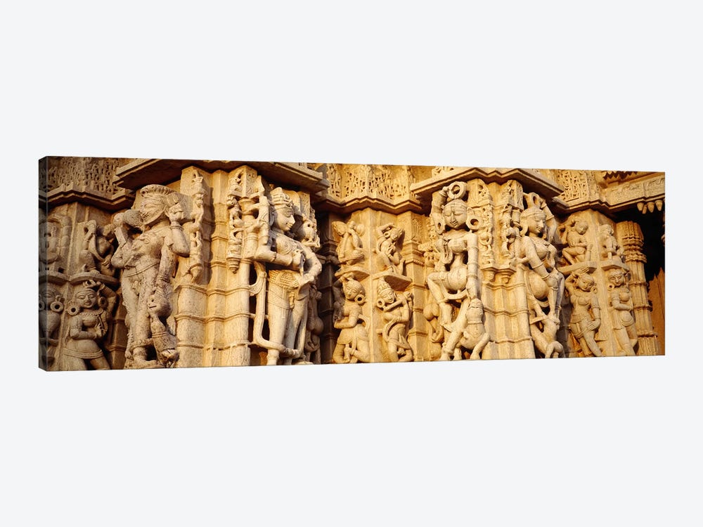 Sculptures carved on a wall of a temple, Jain Temple, Ranakpur, Rajasthan, India by Panoramic Images 1-piece Art Print