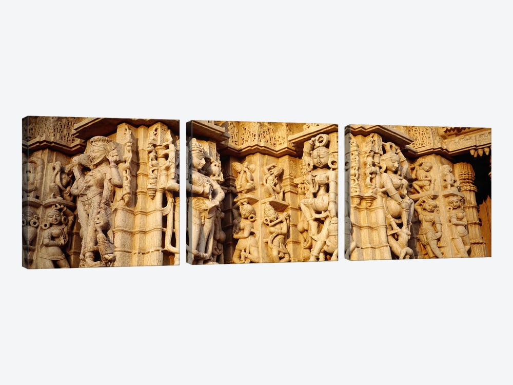 Sculptures carved on a wall of a temple, Jain Temple, Ranakpur, Rajasthan, India by Panoramic Images 3-piece Canvas Art Print