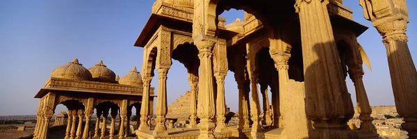 Columns: Low angle view of monuments at a place of burial, Jaisalmer, Rajasthan, India by Panoramic Images