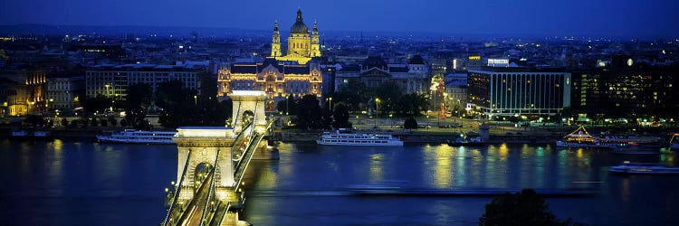 High angle view of a suspension bridge lit up at dusk, Chain Bridge, Danube River, Budapest, Hungary