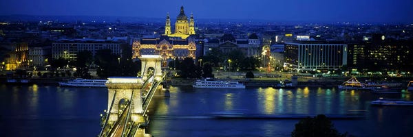 Christianity: High angle view of a suspension bridge lit up at dusk, Chain Bridge, Danube River, Budapest, Hungary by Panoramic Images