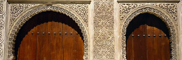 Spain: Low angle view of carving on arches of a palace, Court Of Lions, Alhambra, Granada, Andalusia, Spain by Panoramic Images