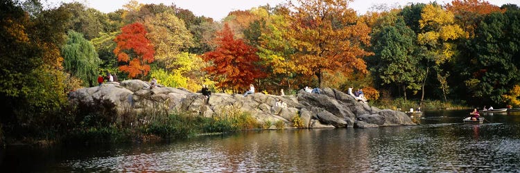 Group of people sitting on rocks, Central Park, Manhattan, New York City, New York, USA