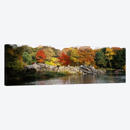Group of people sitting on rocks, Central Park, Manhattan, New York City, New York, USA Canvas Print #PIM5594} by Panoramic Images Canvas Print