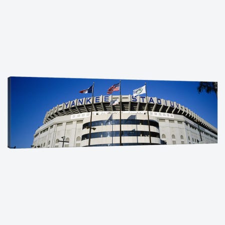 Flags in front of a stadium, Yankee Stadium, New York City, New York, USA Canvas Print #PIM5599} by Panoramic Images Canvas Wall Art