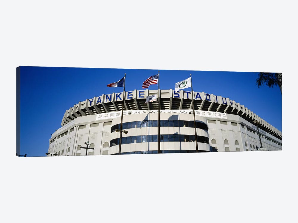 Flags in front of a stadium, Yankee Stadium, New York City, New York, USA by Panoramic Images 1-piece Canvas Artwork