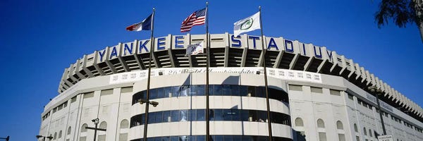 New York City: Flags in front of a stadium, Yankee Stadium, New York City, New York, USA by Panoramic Images