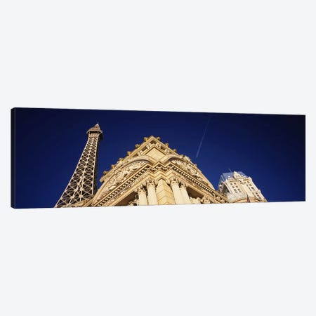 Low angle view of a building in front of a replica of the Eiffel Tower, Paris Hotel, Las Vegas, Nevada, USA Canvas Print #PIM5604} by Panoramic Images Art Print