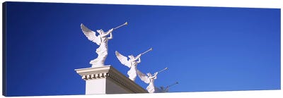 Low angle view of statues on a wall, Caesars Place, Las Vegas, Nevada, USA Canvas Art Print