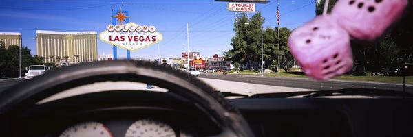 Welcome sign board at a road side viewed from a car, Las Vegas, Nevada, USA