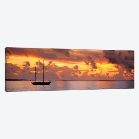 Boat at sunset  Canvas Print #PIM562} by Panoramic Images Art Print