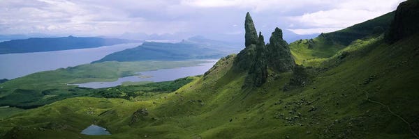 Hillsides: Old Man Of Storr With A High-Angle View Of Loch Leathan, Isle Of Skye, Inner Hebrides, Scotland by Panoramic Images
