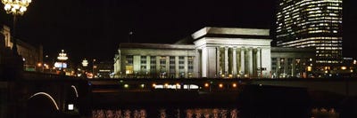 Buildings lit up at night at a railroad station, 30th Street Station, Schuylkill River, Philadelphia, Pennsylvania, USA by Panoramic Images canvas print