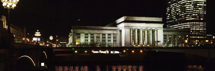 Buildings lit up at night at a railroad station, 30th Street Station, Schuylkill River, Philadelphia, Pennsylvania, USA