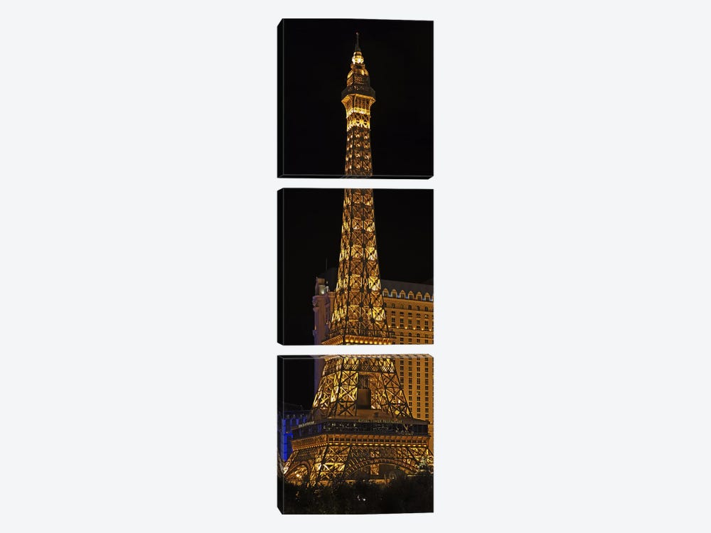 Replica of the Eiffel Tower lit up at night, Paris Las Vegas, Las Vegas, Nevada, USA by Panoramic Images 3-piece Canvas Art