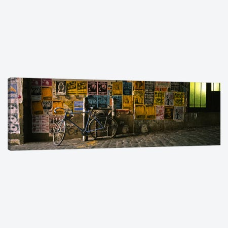 Bicycle leaning against a wall with posters in an alley, Post Alley, Seattle, Washington State, USA Canvas Print #PIM5710} by Panoramic Images Canvas Art