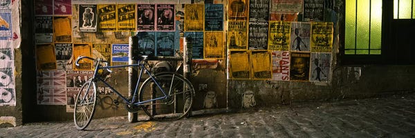 Masonry: Bicycle leaning against a wall with posters in an alley, Post Alley, Seattle, Washington State, USA by Panoramic Images