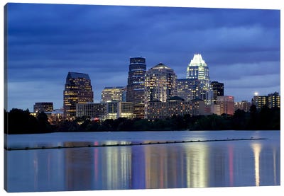 Buildings at the waterfront lit up at dusk, Town Lake, Austin, Texas, USA Canvas Art Print