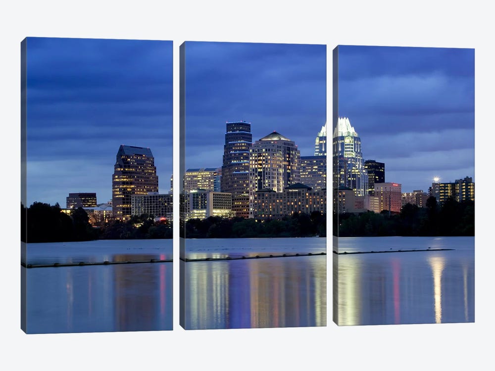 Buildings at the waterfront lit up at dusk, Town Lake, Austin, Texas, USA by Panoramic Images 3-piece Canvas Print