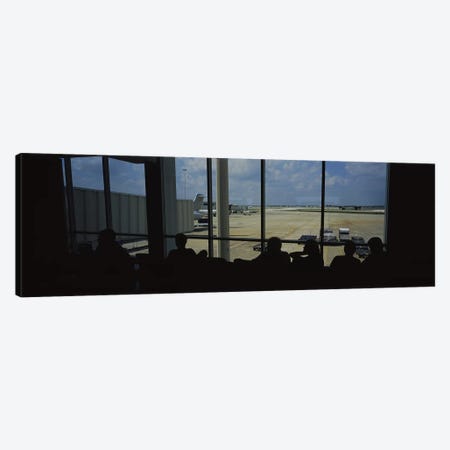Silhouette of a group of people at an airport lounge, Orlando International Airport, Orlando, Florida, USA Canvas Print #PIM5780} by Panoramic Images Canvas Print